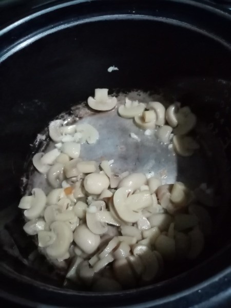 mushrooms & garlic sauteed in pan
