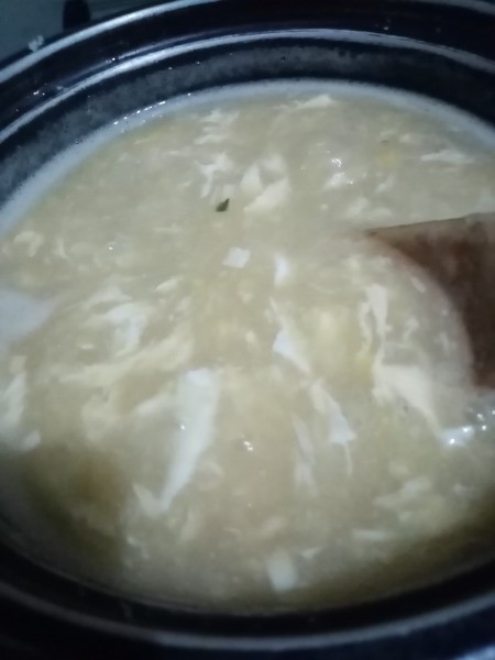 adding egg to soup
