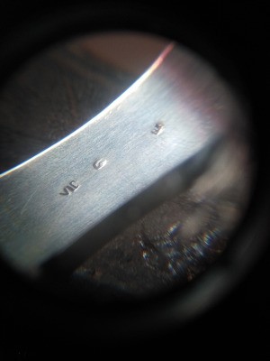 Identifying Jewelry Markings - markings on perhaps a silver ring