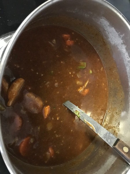 tomatoes, veggies & broth added to pot