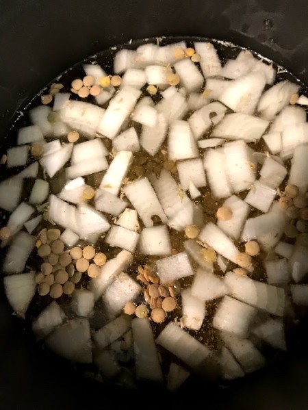 cooking lentils & onions in pan