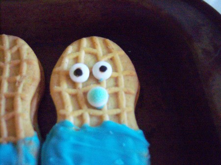 Little Peanut Baby Shower Favors - use melted candy to attach the candy eyes and pacifier, allow to dry or place back in the freezer