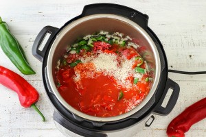 An instant pot with ingredients for a soup.