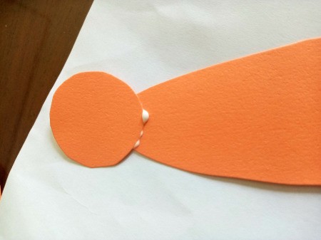 Making a Paper Butterfly Puppet - glue the head to the body