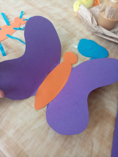 Making a Paper Butterfly Puppet - attach wings to the other body piece