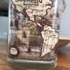 Identifying Drinking Glasses - glass with the continents around the outside