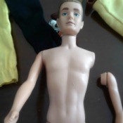 Reattaching the Arms on a Vintage Ken or Barbie Doll - Ken doll with arm detached