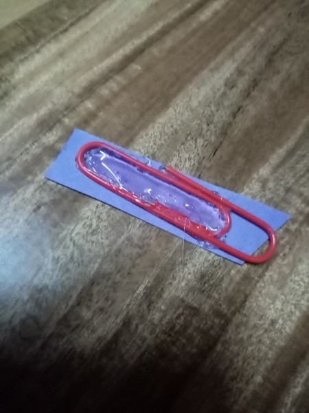 Paperclip Charm for a Zipper Pull - add hot glue to the inner area of the paper clip