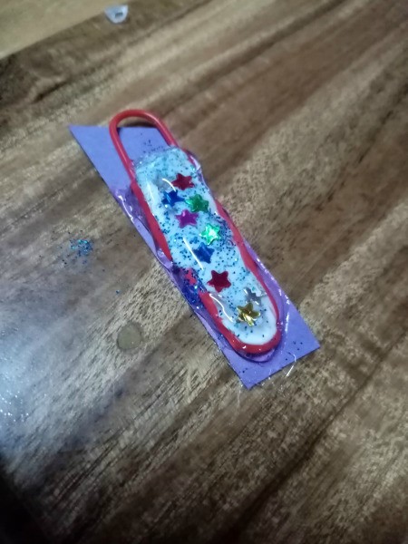 Paperclip Charm for a Zipper Pull - cover the glitter layer with hot glue and allow to set up