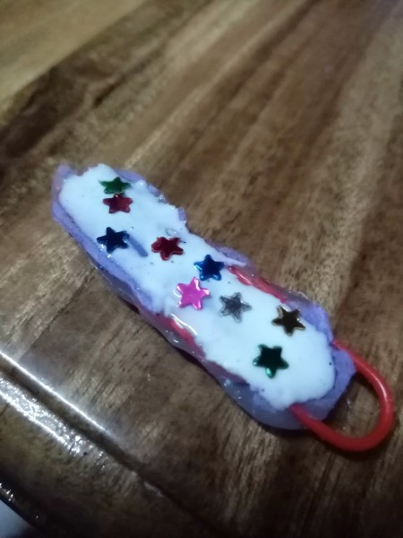 Paperclip Charm for a Zipper Pull - flip over, remover paper and cover with liquid glue