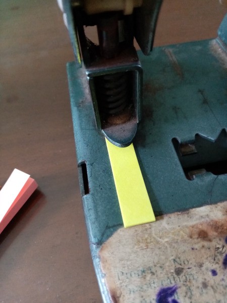 Fixing Jelly Phone Case with Sticky Notes -strip in a hole punch