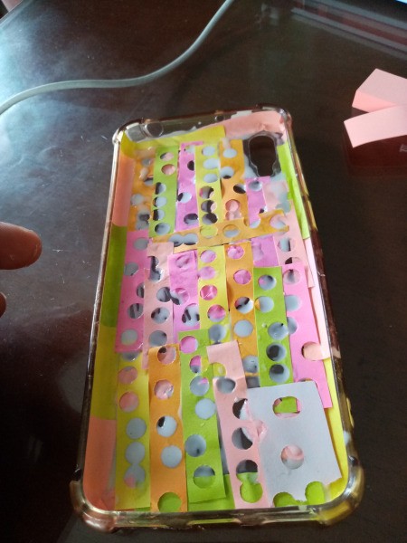 Fixing Jelly Phone Case with Sticky Notes - fill in with the used strips