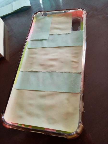 Fixing Jelly Phone Case with Sticky Notes - cover the entire inside with unused strips