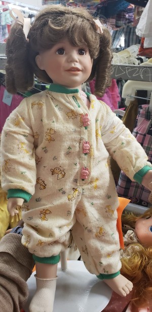 Identifying a Porcelain Doll - doll wearing pajamas