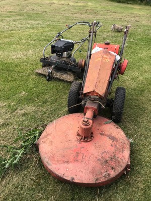 A vintage riding lawnmower