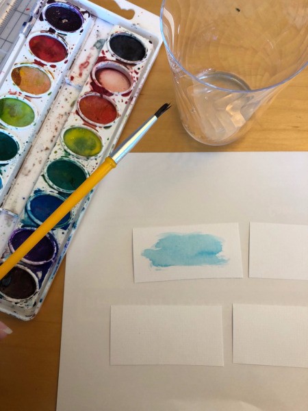 DIY Folded Name Place Cards - painting the table cards