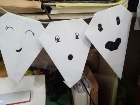 Paper Ghost Banner - insert string through the top fold and hang