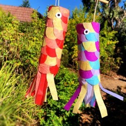 DIY Japanese Carp Streamer - two finished carp streamers hanging outside