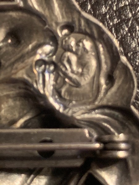Identifying a Hallmark on a Brooch - man and woman embracing