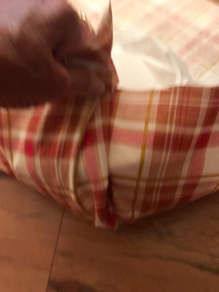 Crafty Toilet Paper Roll Pumpkins  - pleating fabric at one corner