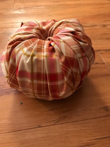 Crafty Toilet Paper Roll Pumpkins - fabric pleated all around and tucked into the center of the roll