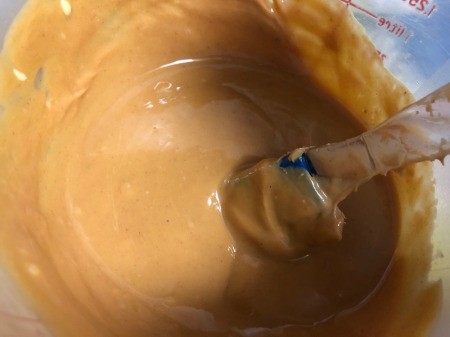 mixing butter & peanut butter in large bowl