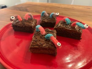 Spooky Halloween Worm Brownies - 4 worm brownies on a red plate