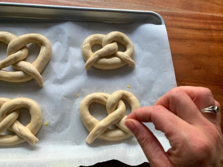 Pretzel Pumpkins - sprinkle with coarse salt
