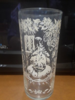Value of a Vintage Drinking Glass - tall glass with white pattern of woman with umbrella perhaps in a garden