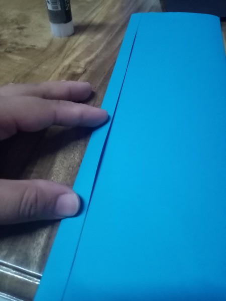 Halloween Hand Puppet - fold the strip over and glue in place creating a flat tube