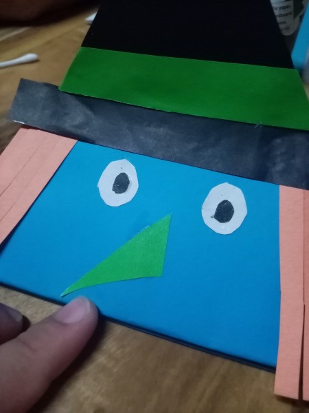 Halloween Hand Puppet - draw or glue on facial features, such as eyes and a nose