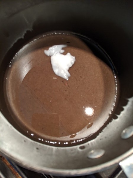 melting coconut oil in pan