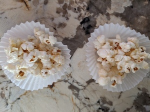 Honey Coconut Popcorn in paper cups