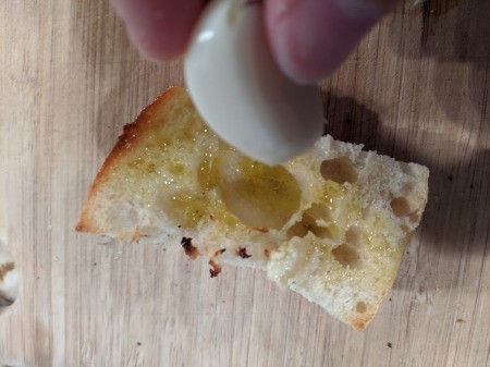 garlic rubbed on baguette