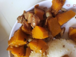 Squash Adobo with Pork Bits on plate