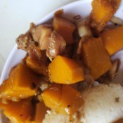 Squash Adobo with Pork Bits on plate