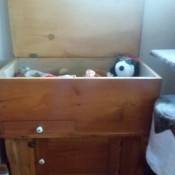 Identifying a Piece of Vintage Furniture - perhaps a homemade chest with a top that lifts for storage, a small drawer on the left and a door on the bottom with storage behind it