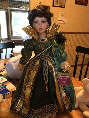 Value of a Collectible Memories Porcelain Doll - doll wearing a green ball gown