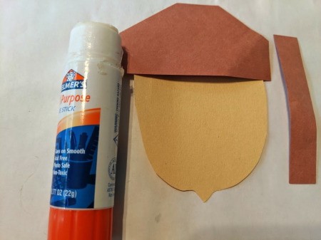 Paper Acorn Kids' Craft - glue stick and acorn parts including a stem