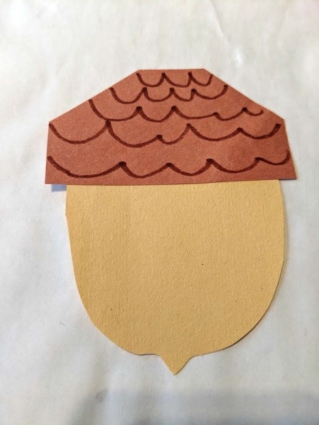 Paper Acorn Kids' Craft - use a brown marker to add details to the cap