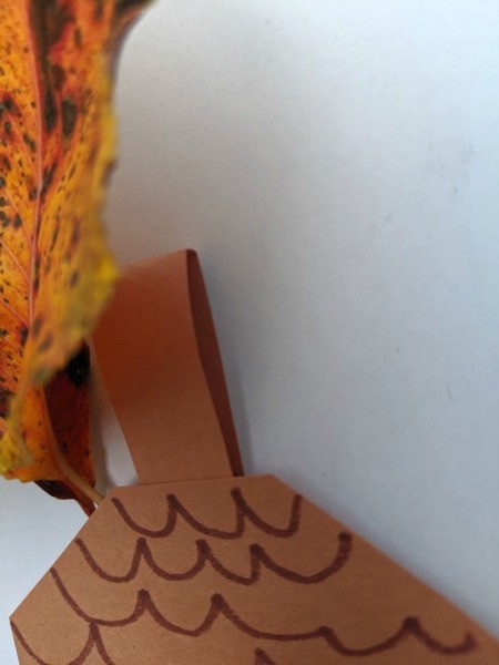 Paper Acorn Kids' Craft - glue paper strip stem/hanger to the back of the cap