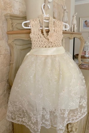 A crocheted bodice dress for a young girl.