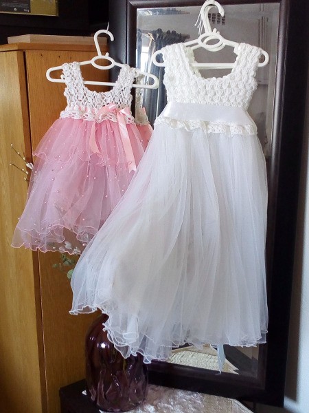 Crocheted bodice dresses for a young girl.