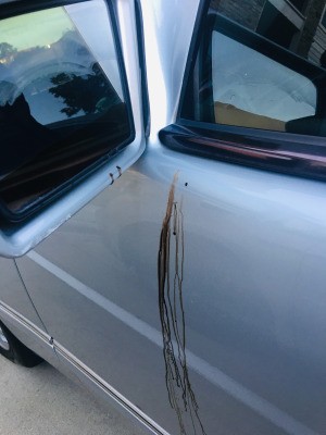 Removing a Stain on a Car's Exterior - black streaks on car door