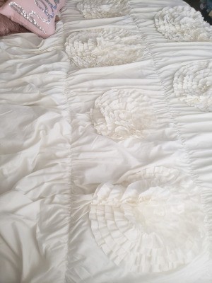 Repairing a Comforter - white comforter with raised flowers