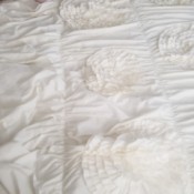 Repairing a Comforter - white comforter with raised flowers