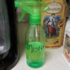 A spray bottle containing oil for cooking.