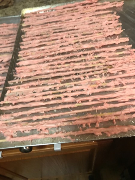 pink chocolate skewers on tray