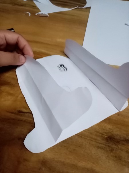 Ghost Night Light - attach the two thinner bell shapes to the back of the large bell with the face, as shown