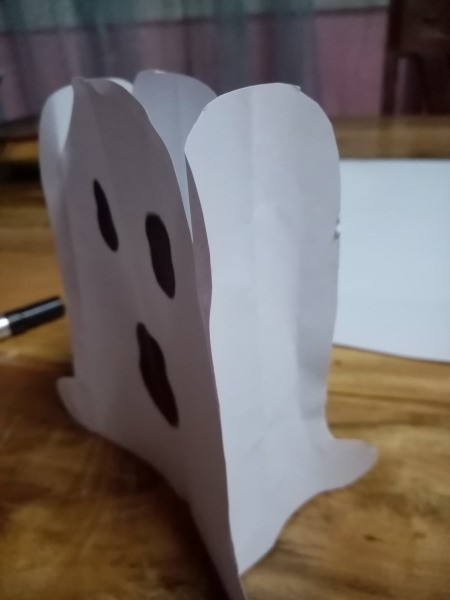 Ghost Night Light - then attach the other half of the two small bells to the large one with the hole so that it looks like this